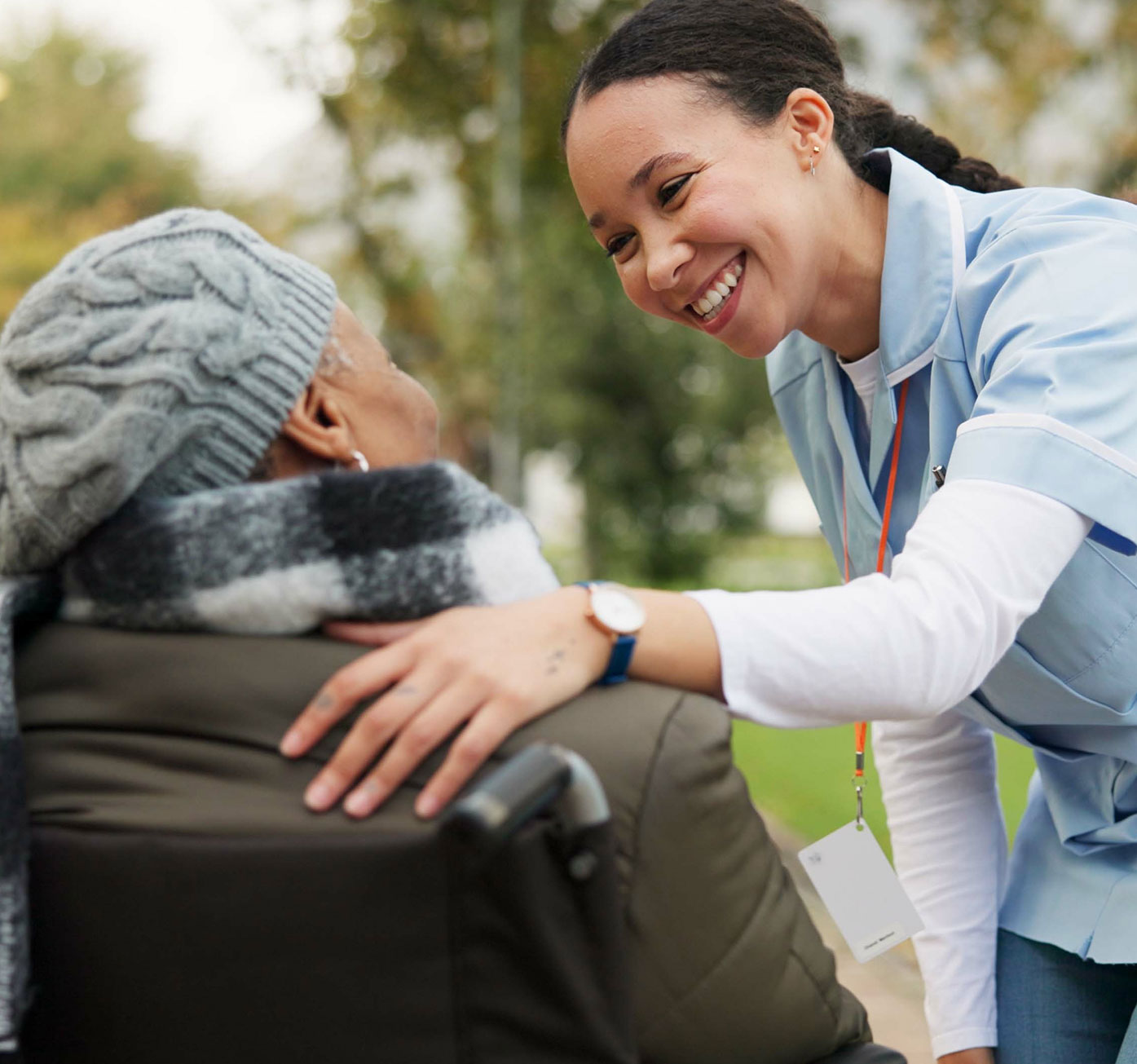 Friendly woman helping someone in the park